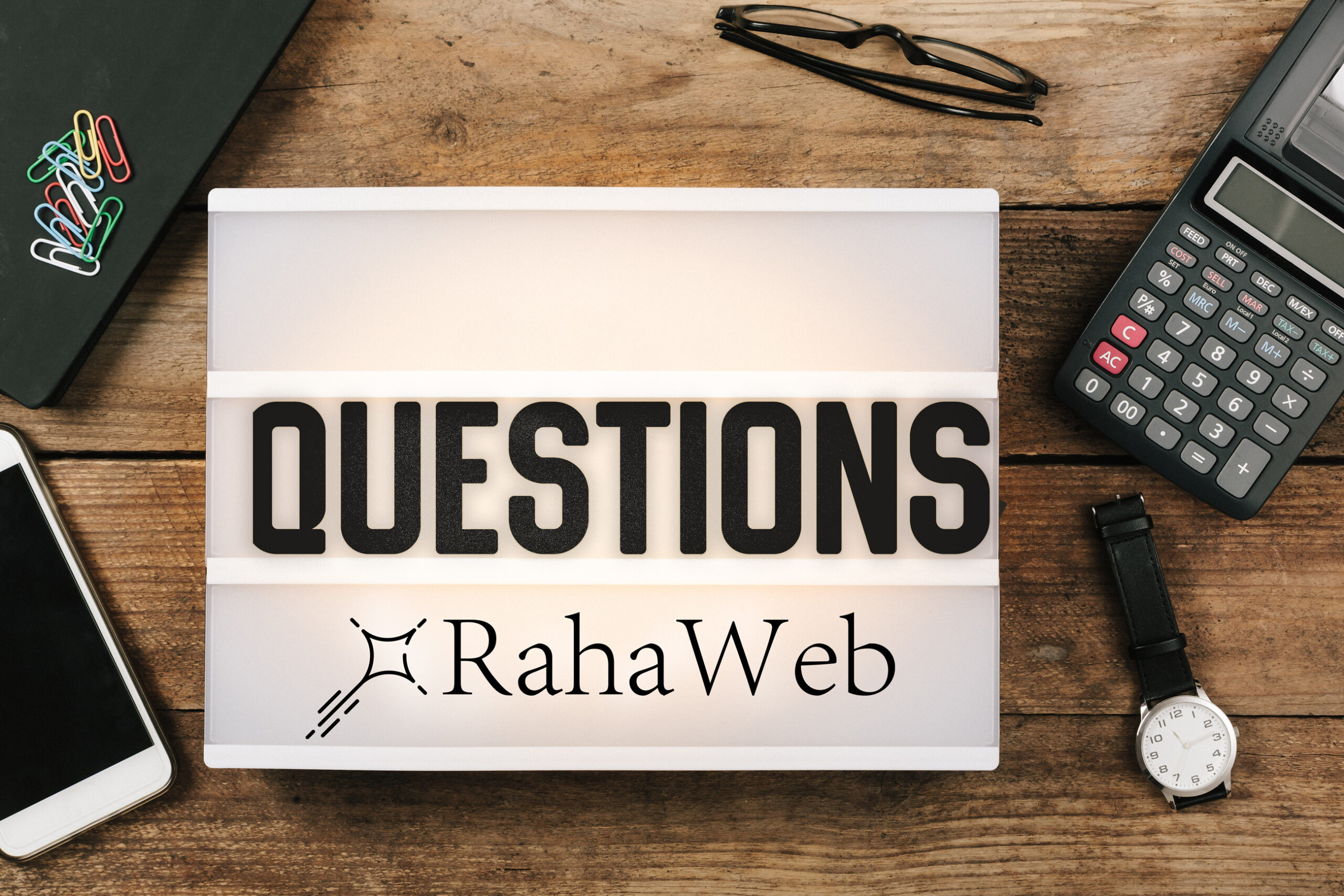 A vintage style light box that shown word: questions - represents RahaWeb FAQ