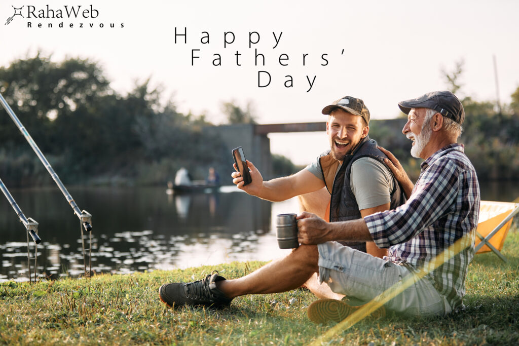 Cheerful father and son having fun and laughing while fishing by the river - represents the Fathers' Day - RahaWeb